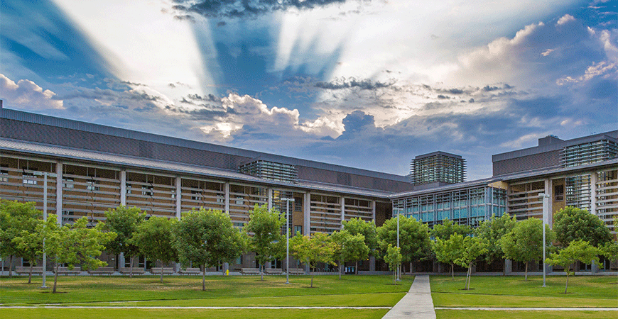 Bright morning view of UC Merced campus quad and buildings