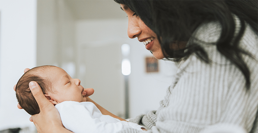 Mother holding newborn baby
