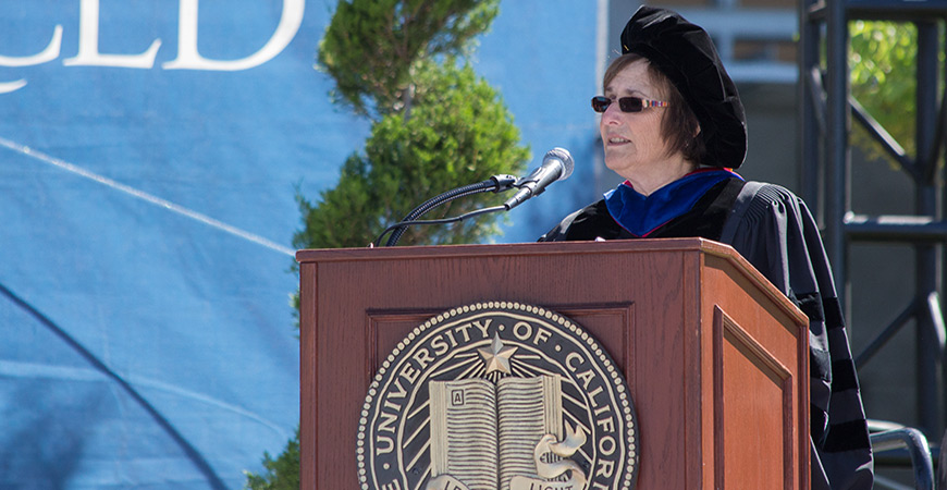 Graduate Dean Marjorie Zatz speaking from the podium