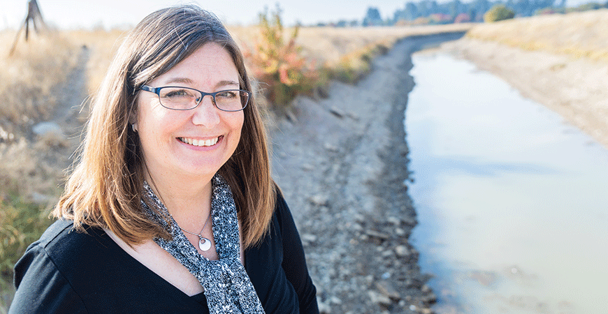 Professor Katrina Hoyer posing outdoors