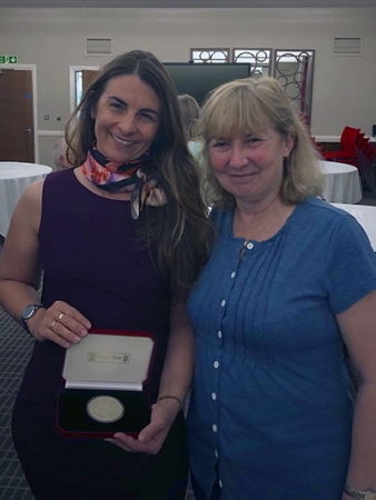 Professor Hirst and her Ph.D. adviser, Helen Gleeson, with the Hilsum Medal