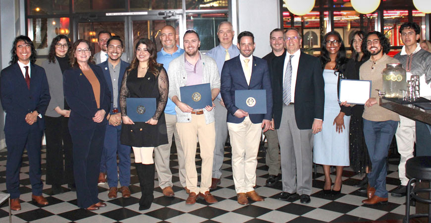 Several people, including graduates of UC Merced Professional Certificate in California Government and Policy program, plus faculty, staff and friends.