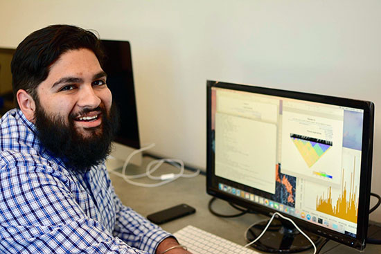 Vicente Ramirez sitting at a computer desk