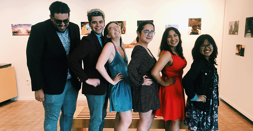 Executive Board Members of Young Artist Movement posing in art gallery