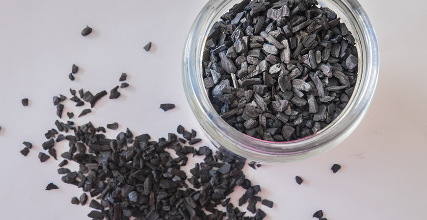 Biochar is high in carbon and created by heating biomass at moderate temperatures in a process called pyrolysis.