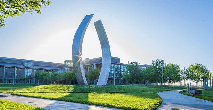 Morning view of Beginnings Sculpture on UC Merced campus quad
