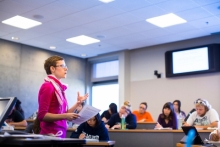 Professor lecturing students in classroom